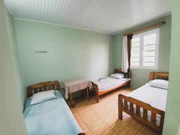 Фото номера Стандартный трехместный номер с видом на море Гостевой дом Ureki House г. Уреки 6