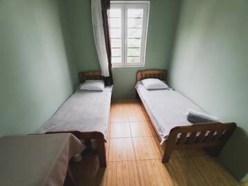 Фото номера Стандартный трехместный номер с видом на море Гостевой дом Ureki House г. Уреки 11
