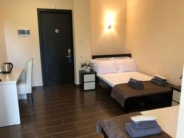 Фото номера Большой двухместный номер с 1 кроватью Отель GNS Hotel г. Уреки 20