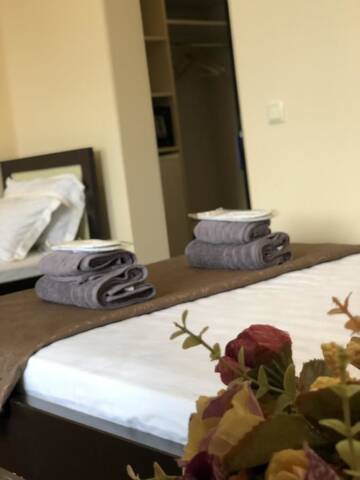 Фото номера Стандартный четырехместный номер Отель GNS Hotel г. Уреки 7