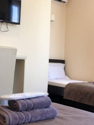 Фото номера Стандартный трехместный номер Отель GNS Hotel г. Уреки 7