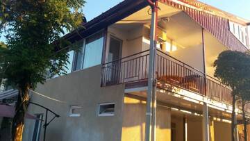 Фото номера Стандартный трехместный номер с видом на море Гостевой дом Ureki GuestHouse г. Уреки 13