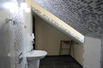 Фото номера Четырехместный номер с ванной Отель Hotel Lion г. Уреки 2