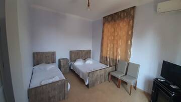 Фото номера Трехместный номер Делюкс с видом на море Отель Hotel Evrazia г. Уреки 8