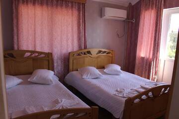 Фото номера Люкс с 2 спальнями Отель Hotel Evrazia г. Уреки 6