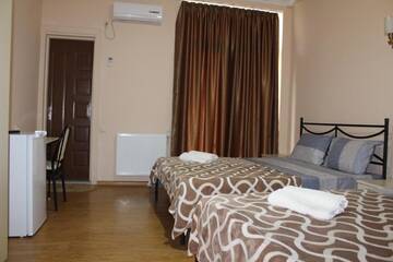 Фото номера Классический четырехместный номер Отель Hotel Lika г. Уреки 11