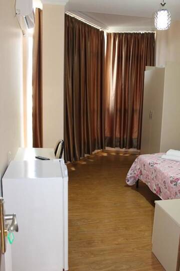 Фото номера Большой двухместный номер с 1 кроватью Отель Hotel Lika г. Уреки 15