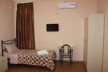 Фото номера Классический четырехместный номер Отель Hotel Lika г. Уреки 8