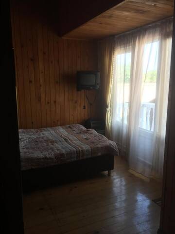 Фото номера Четырехместный номер с балконом Гостевой дом Nino Guest House г. Уреки 6